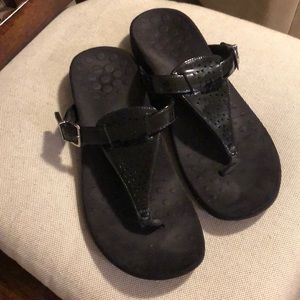 Bionic Black patent leather sandals